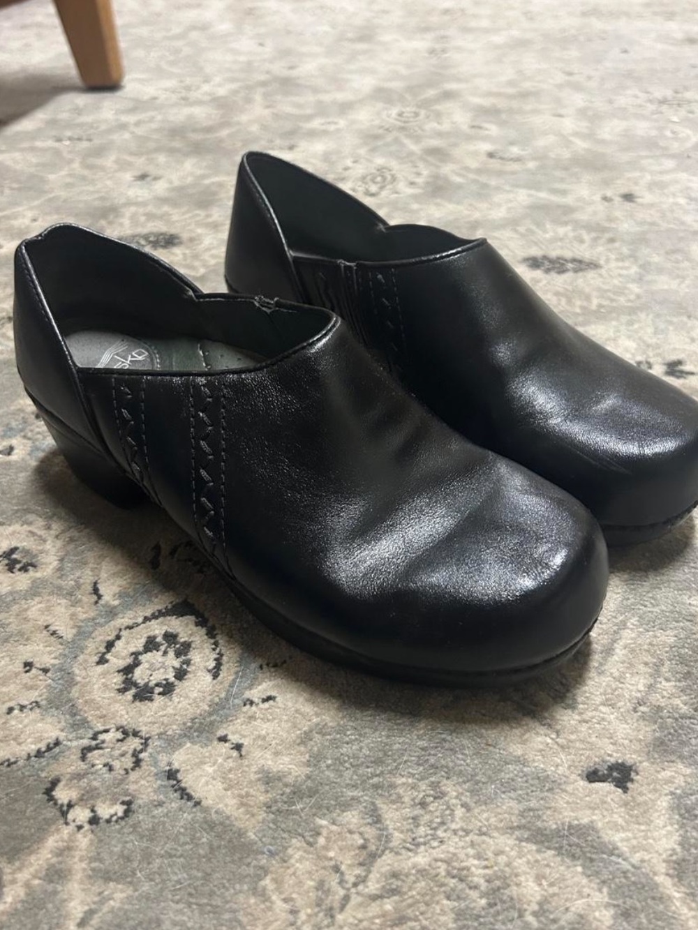 Dansko Black Leather Slip-On Clogs